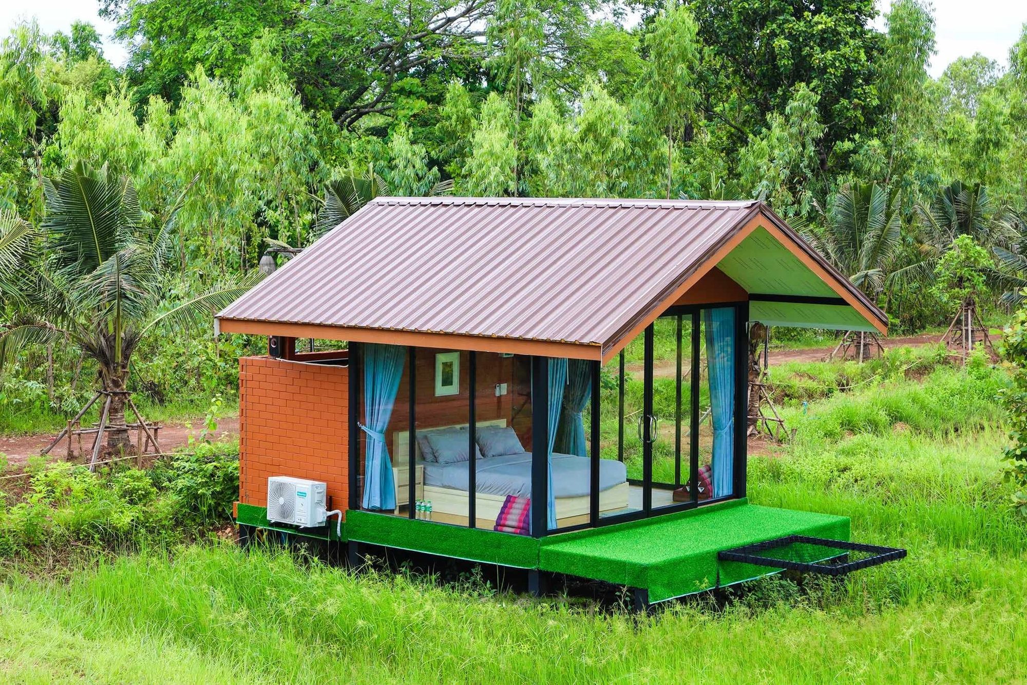 A guest cabin looking onto the rice fields